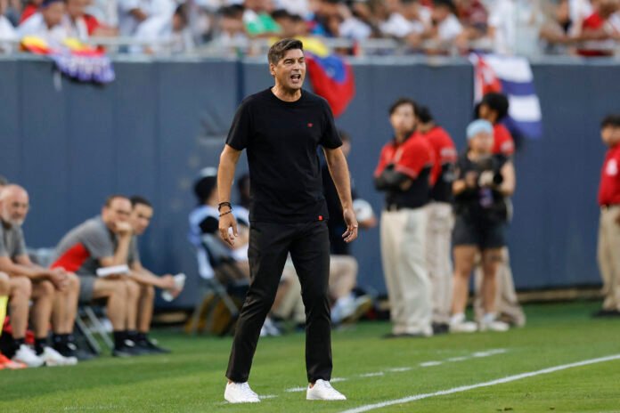 AC Milan's manager Paulo Fonseca yells to his team during the first half of the pre-season club friendly football match between AC Milan and Real Madrid at Soldier Field in Chicago, Illinois, on July 31, 2024.