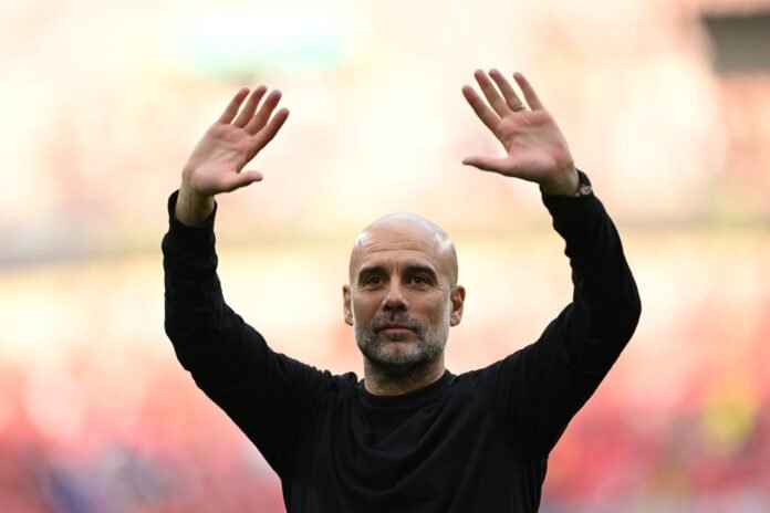 LONDON, ENGLAND - APRIL 27: Pep Guardiola, Manager of Manchester City, acknowledges the fans after the team's victory during the Emirates FA Cup Semi Final match between Nottingham Forest and Manchester City at Wembley Stadium on April 27, 2025 in London, England.