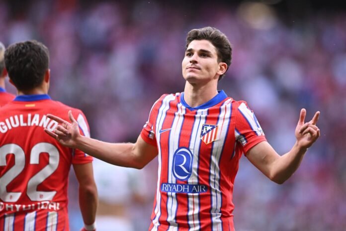 MADRID, SPAIN - MAY 18: Julian Alvarez of Atletico de Madrid celebrates scoring his team's third goal during the La Liga EA Sports match between Atletico de Madrid and Real Betis Balompie at Riyadh Air Metropolitano on May 18, 2025 in Madrid, Spain.