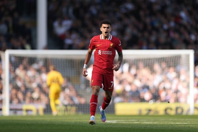 LONDON, ENGLAND - APRIL 06: Luis Diaz of Liverpool celebrates scoring his team's second goal during the Premier League match between Fulham FC and Liverpool FC at Craven Cottage on April 06, 2025 in London, England.