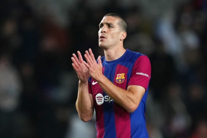 BARCELONA, SPAIN - MARCH 30: Oriol Romeu of FC Barcelona applauds the fans after the LaLiga EA Sports match between FC Barcelona and UD Las Palmas at Estadi Olimpic Lluis Companys on March 30, 2024 in Barcelona, Spain.