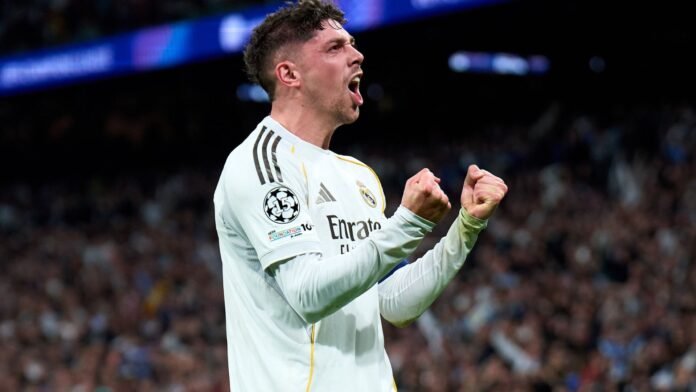 Federico Valverde of Real Madrid celebrates scoring his team's second goal during the UEFA Champions League 2025/26 Round of 16 First Leg match between Real Madrid CF and Manchester City FC at Estadio Santiago Bernabeu on March 11, 2026 in Madrid, Spain.