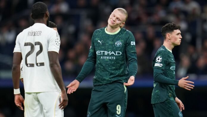 Erling Haaland of Manchester City reacts during the UEFA Champions League 2025/26 League Phase MD6 match between Real Madrid C.F. and Manchester City at Estadio Santiago Bernabeu on December 10, 2025 in Madrid, Spain.