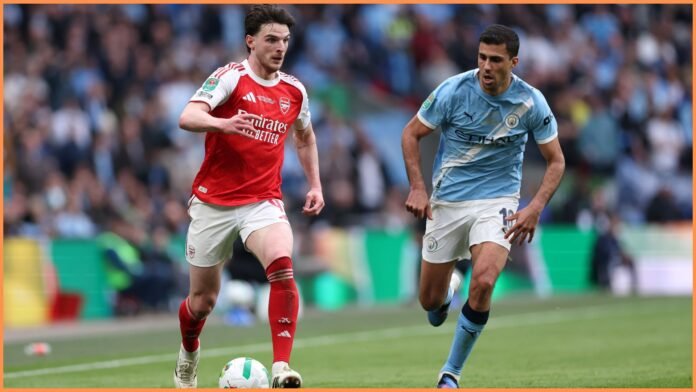 LONDON, ENGLAND - MARCH 22: Declan Rice of Arsenal takes on Rodri of Manchester City during the Carabao Cup Final match Arsenal and between Manchester City at Wembley Stadium on March 22, 2026 in London, England.