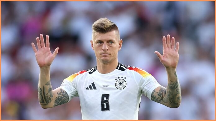 STUTTGART, GERMANY - JULY 05: Toni Kroos of Germany acknowledges the fans after the team's defeat in the UEFA EURO 2024 quarter-final match between Spain and Germany at Stuttgart Arena on July 05, 2024 in Stuttgart, Germany.